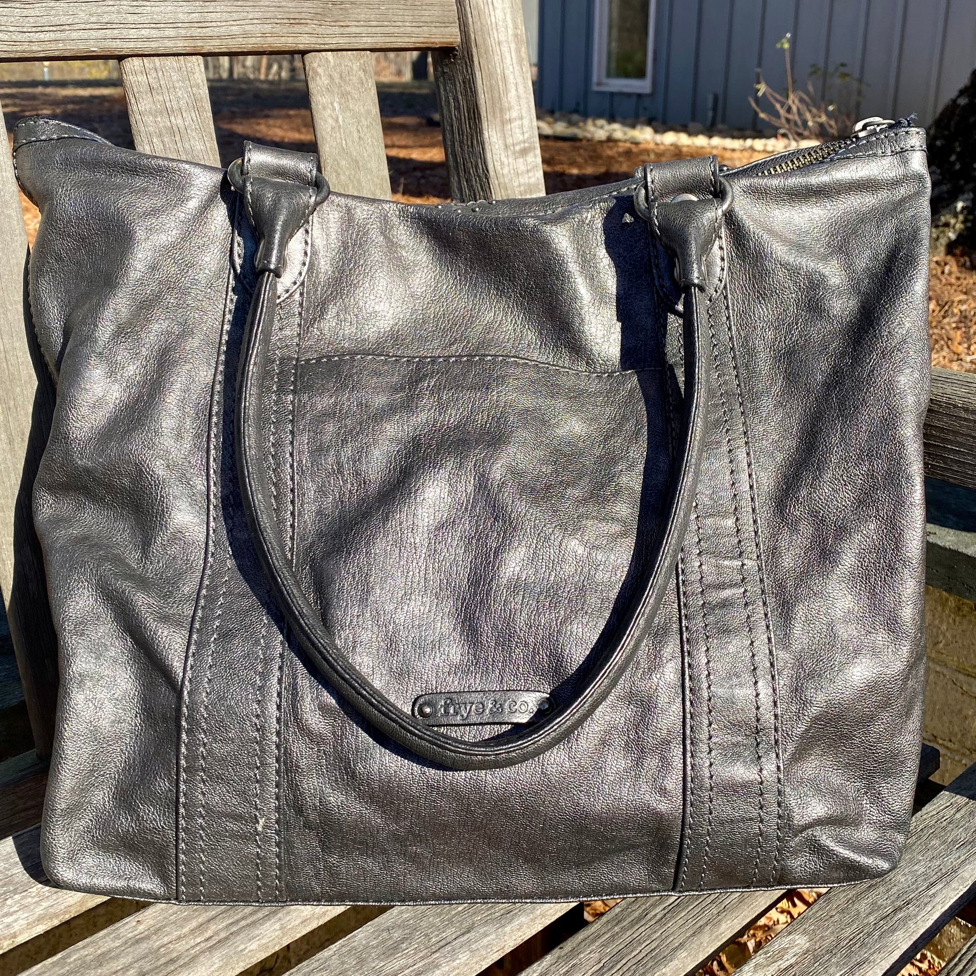 Grey top studded handbag